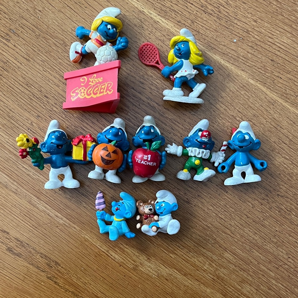 11 Smurfs Figurine Collection   Inc 2 Smurfettes, 2 babies, and a fuzzy one.